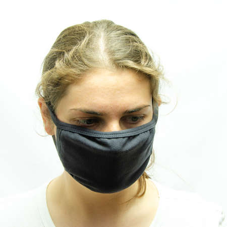 A girl in a medical maskの写真素材