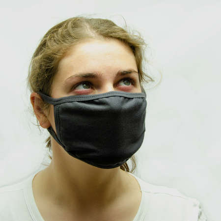 A girl in a medical maskの写真素材