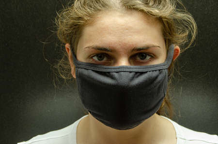 A girl in a medical maskの写真素材