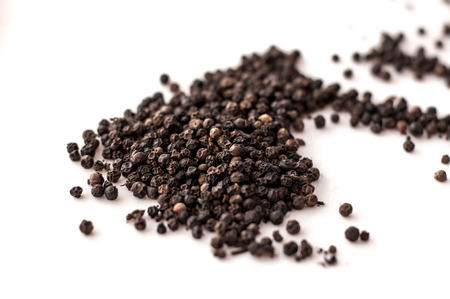 Black pepper was placed on a white background.の写真素材