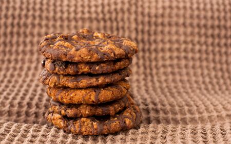 Chocolate chip cookies on linen napkin close upの写真素材