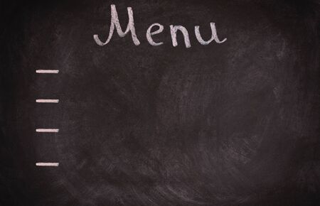 Restaurant menu board on blackboard. isolated over white background.の写真素材
