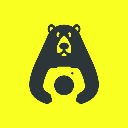 honey bear cute photographer camera lens mascot modern simple logo icon vector illustrationのイラスト素材
