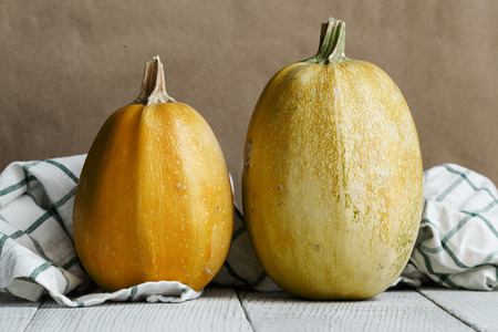 Yellow Zucchini On A White Wooden Board. Still Life.の写真素材