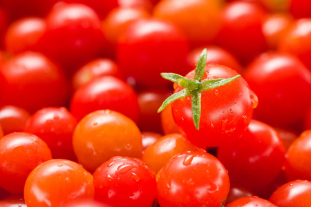 Fresh Small Red Cherry Tomato. Shallow Depth Of Field. Close Up. Macro. Angle View. Background.の写真素材