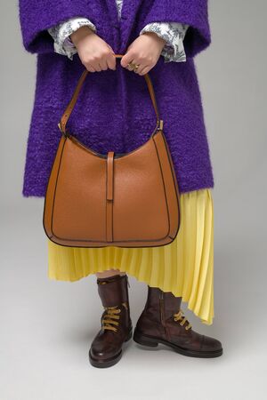 Close Up Fashion Details, Elegant Coat. Elegant Fashionable Woman With Leather Bag. Stylish Outfit And Fashion Concept.の写真素材