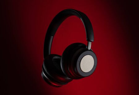 Wireless Over-Ear Headphones On A Red Background.の写真素材