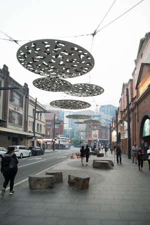 Sydney, NSW - Chinatown during dusk with people walking by near paddysのeditorial素材