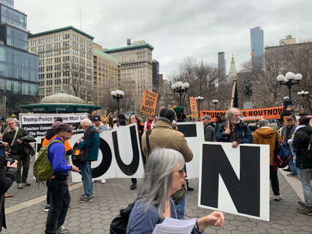 New York, NY, USA - January 12 2019: A Anti Trump Pence Rally for impeachment and removal is occurring in union square which is a popular location for many protests and political movementsのeditorial素材