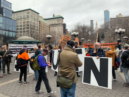 New York, NY, USA - January 12 2019: A Anti Trump Pence Rally for impeachment and removal is occurring in union square which is a popular location for many protests and political movementsのeditorial素材