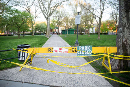 Hoboken, NJ, USA - April 15 2020: Church Square Park Closed due amid due to Coronavirus Scare. The streets are desolate and no one is allowed to go out to prevent pandemic from spreadinのeditorial素材