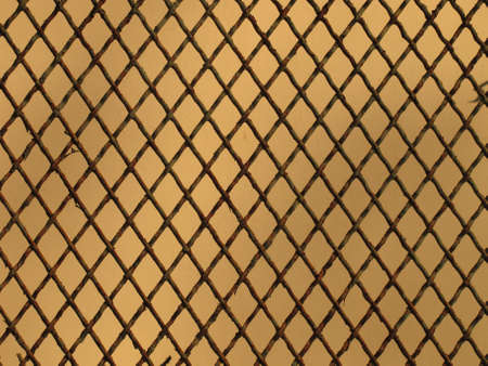 fence made by iron net lozenge shapedの写真素材