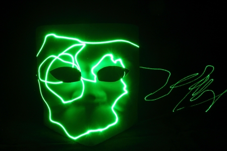 mistery mask green with light signの写真素材