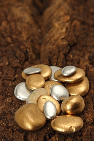Richness of gold pebbles or nuggetsの写真素材