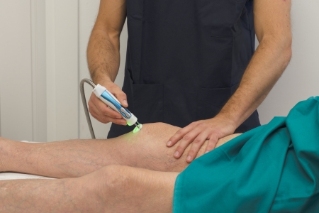 Laser therapy on a knee