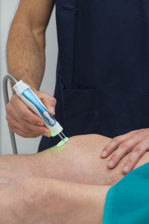 Laser therapy on a knee