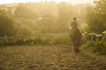 Horse riding silhouetteの写真素材