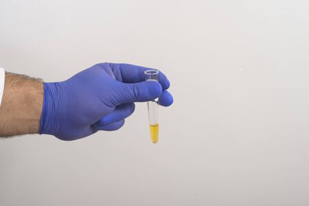 holding test tubeの写真素材