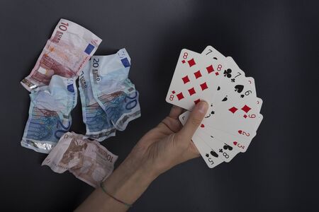 card player, waste moneyの写真素材