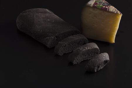 Black bread with vegetal carbon and cheese