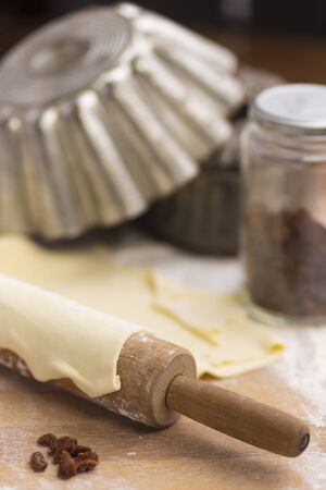 Making a cake with raisinの写真素材