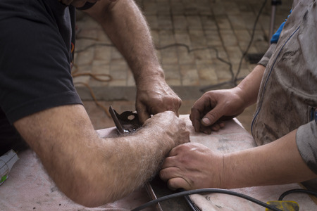 Hands grounding metalの写真素材