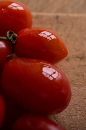 Garlic and tomatoes with windows reflectionの写真素材