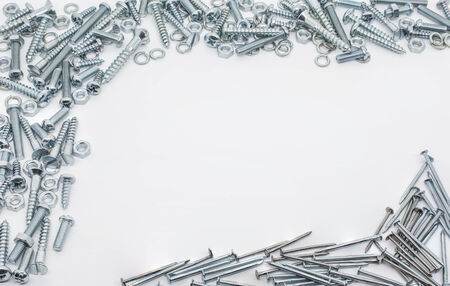 Collection Of Iron Screws, Nuts, Nails And lockwashers Above And Below