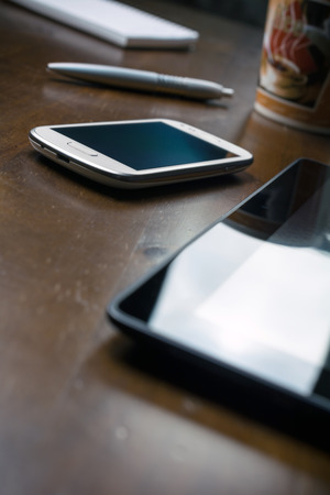 Business Background With Tablet, Mobile Phone, Pencil, Coffee Notepad 1の写真素材