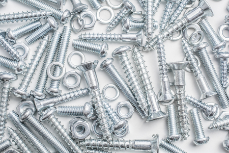 Macro Of A Big Collection Of Iron Screws, Nuts and Lockwashersの写真素材
