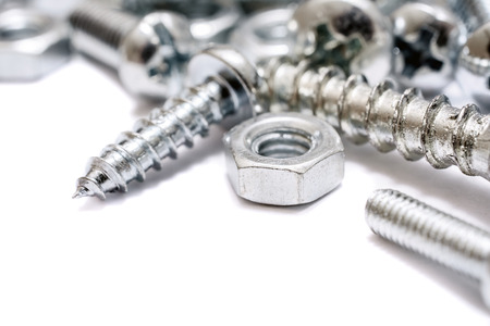 A Macro Of A Small Collection Of Iron Screws, Woodscrews And Bolts With Free Space