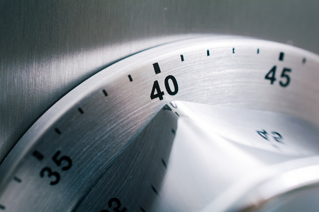 40 Minutes - Analog Chrome Kitchen Timer Placed On A Refrigeratoの写真素材