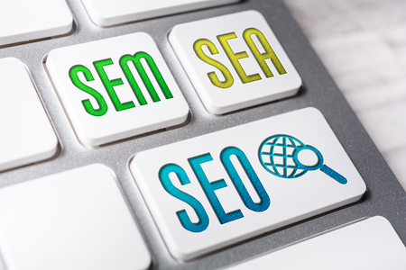 Macro Of The Words SEO, SEM And SEA On Three Keyboard Buttonsの写真素材