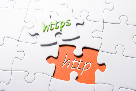 The Words HTTPS And HTTP In Missing Piece Jigsaw Puzzleの写真素材
