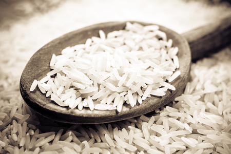 A Wooden Kitchen Spoon On A Pile Of Rice, Monochrome Colorsの写真素材