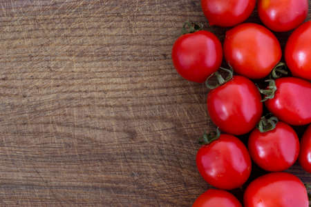 fresh tomatoes on the tableの写真素材