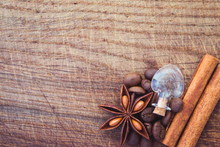 coffee beans, anise and cinnamon on table