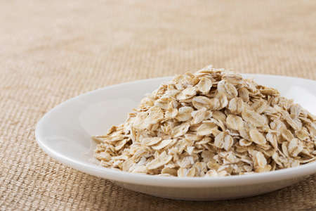 handful of oatmeal in a white plate