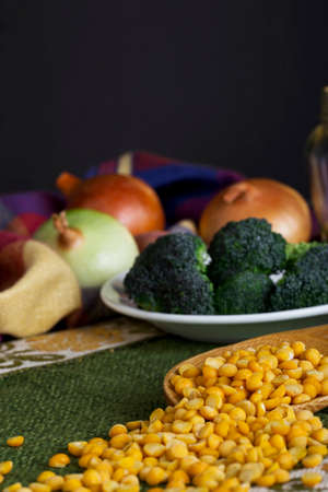 handful of yellow peas on a tableの写真素材