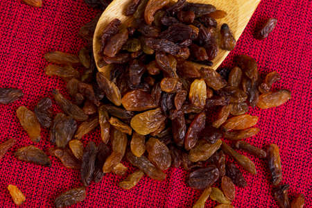 a handful of raisins on the tableの写真素材