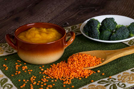 handful of red lentils on a tableの写真素材