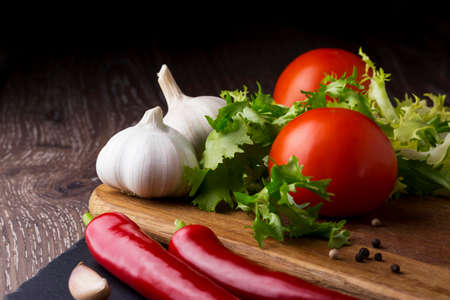 the different vegetables on a wooden backgroundの写真素材