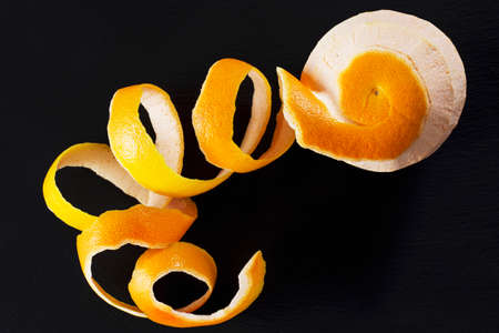 peel of grapefruit on a black backgroundの写真素材