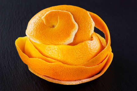 peel of grapefruit on a black backgroundの写真素材