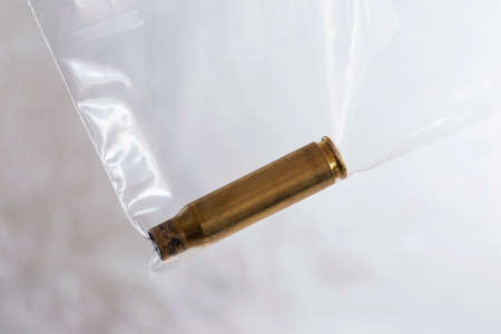 shell casings is in the package for evidenceの写真素材