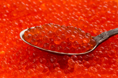 a spoon of the red fish eggsの写真素材