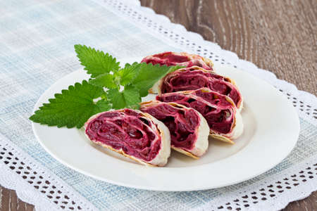 the cherry strudel on a white plateの写真素材