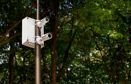 the surveillance camera on a lamp postの写真素材