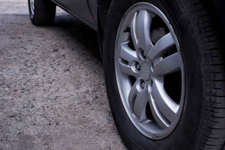 the black tires on a car diskの写真素材