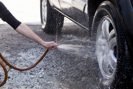 the car is washing in soap sudsの写真素材